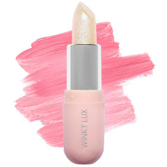 Baume Unicorn Glimmer de Winky Lux emballage élégant pour le rituel quotidien.