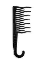 Le peigne XO Curls à dents larges assure un démêlage en douceur sous la douche.