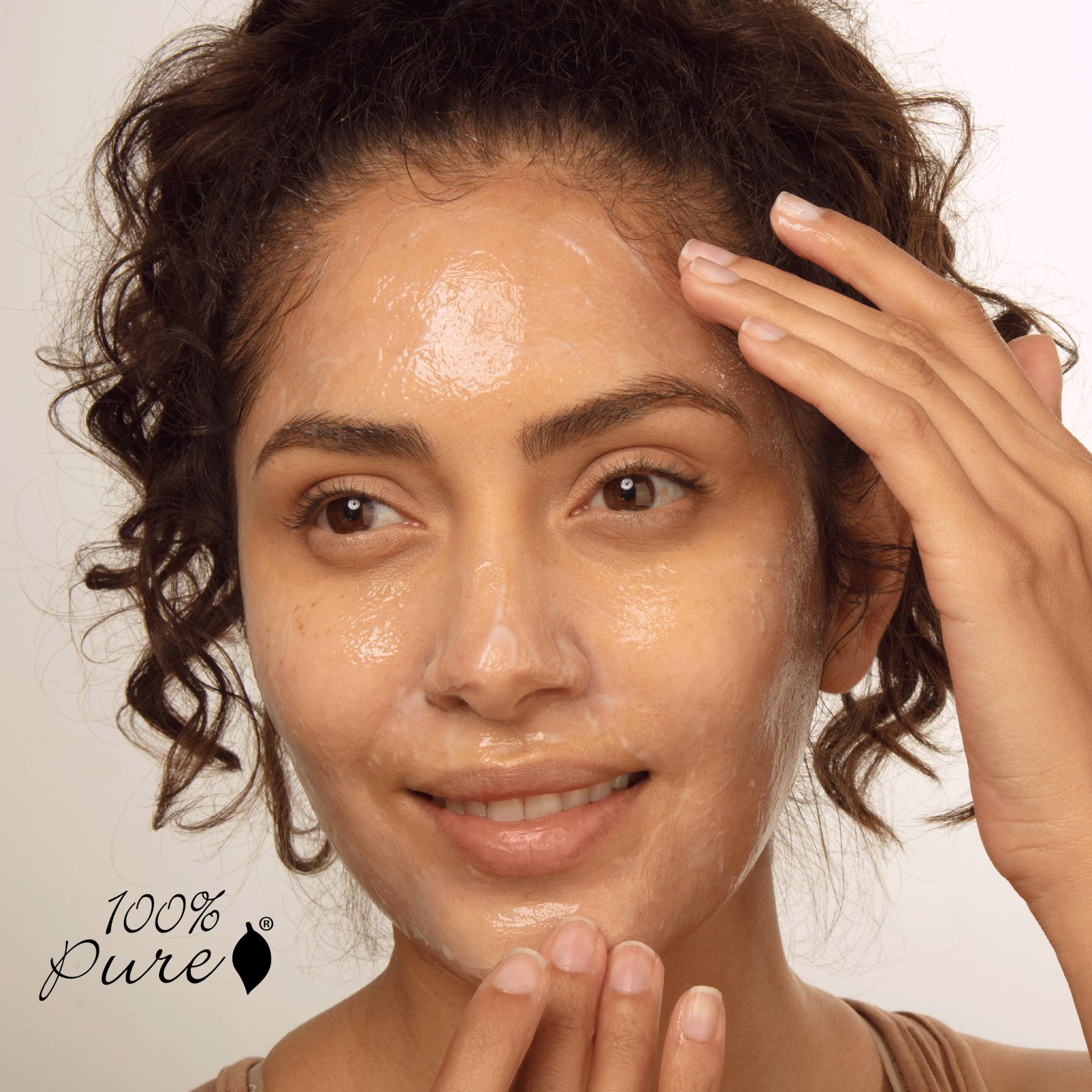 100% PURE massage visage mains: application douce pour nourrir la peau