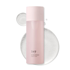 107 tonique à l'acide hyaluronique — bouteille translucide et hydratation légère.