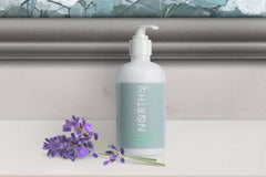 Close-up of 39° North conditioner label emphasizes eucalyptus and lavender scent for spa vibes.