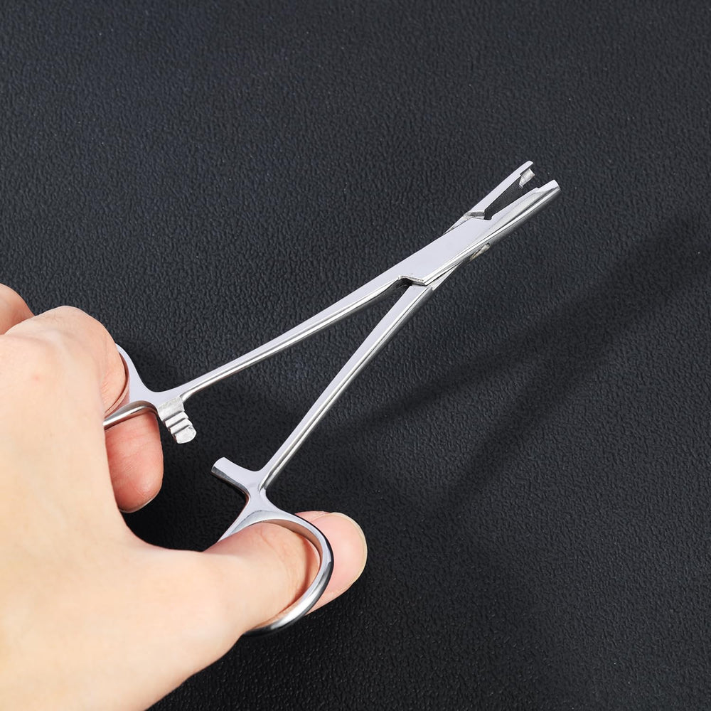Outil en acier inox AccGin, durable et hygiénique pour piercings.