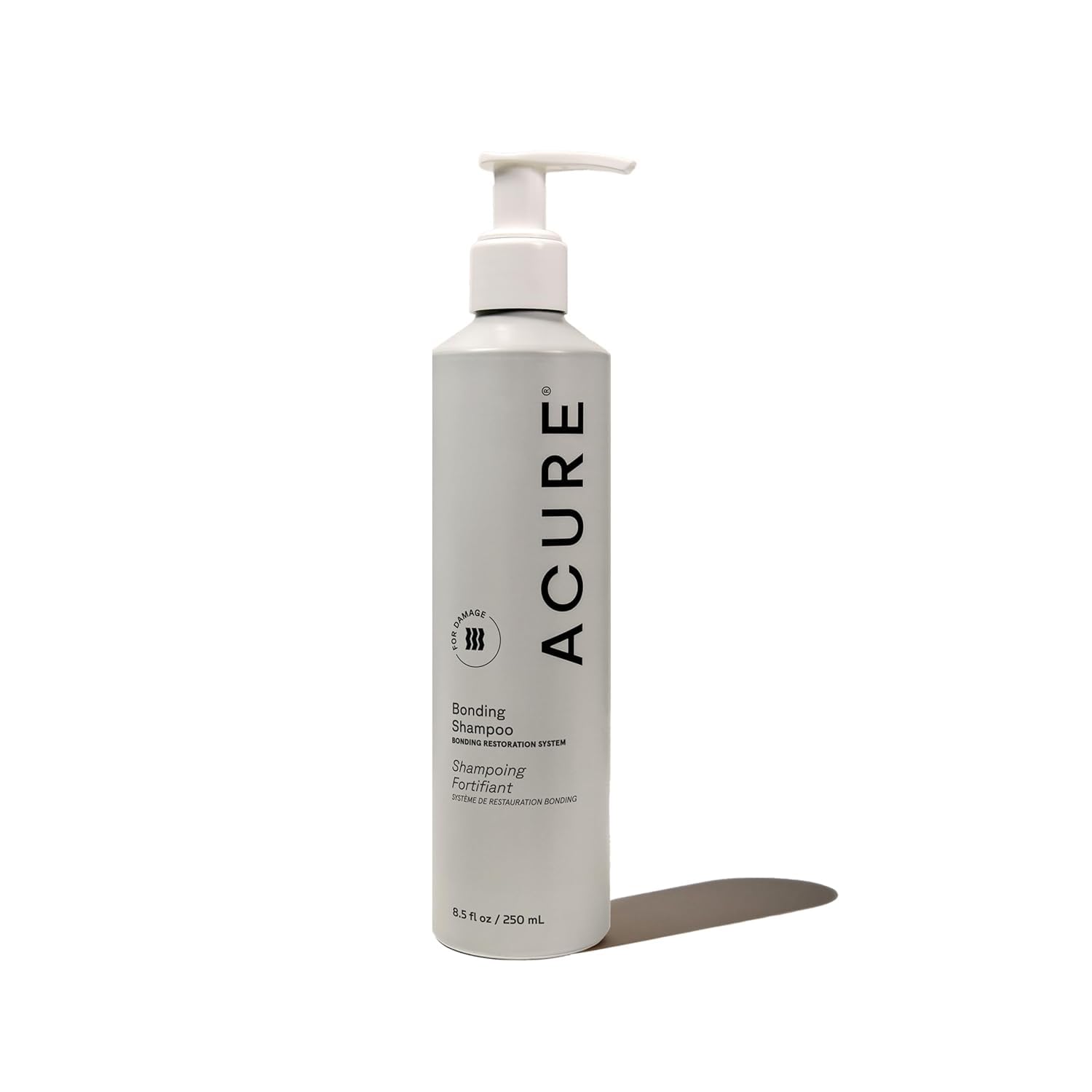 Acure Bonding Shampoo présente sa bouteille, parfaite pour une routine quotidienne douce sur cheveux fragiles.