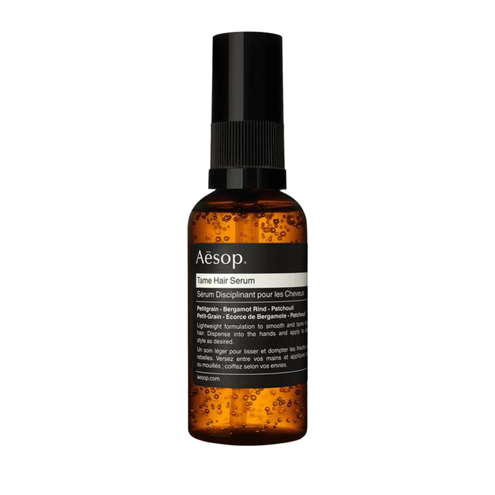 Sérum Tame d'Aesop, bouteille élégante, dompte les frisottis sans alourdir