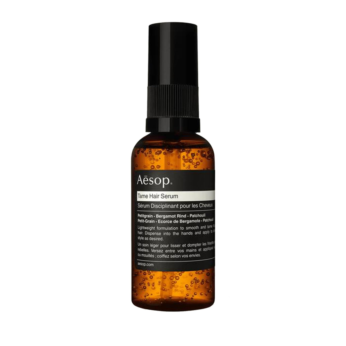 Sérum Tame d'Aesop, bouteille élégante, dompte les frisottis sans alourdir