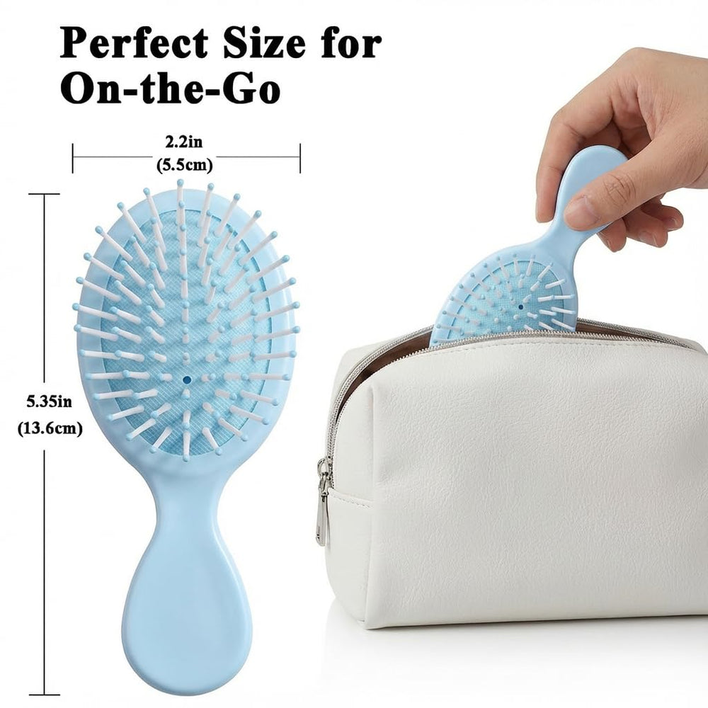 Brosse AESPAKO humide mini pour tous types de cheveux, pratique et légère.