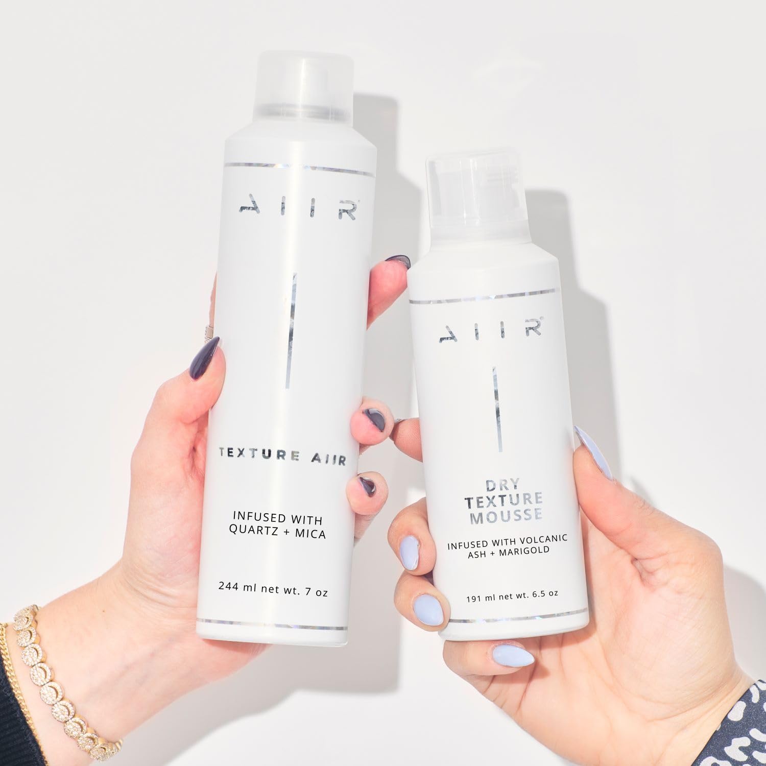 AIIR Texture Styling Spray — démonstration de volume dynamique sans lourdeur.