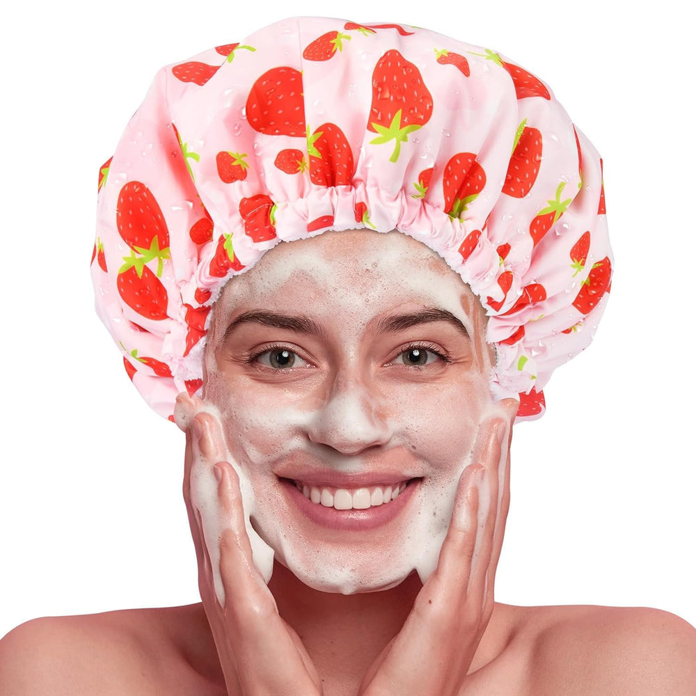 Idée cadeau Aileam, bonnet de douche rose pour cheveux soignés.