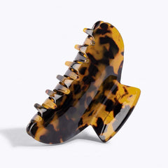 Accessoire Aileam pinces banane tortue, imprimé léopard, idéal pour créer un chignon rapide.