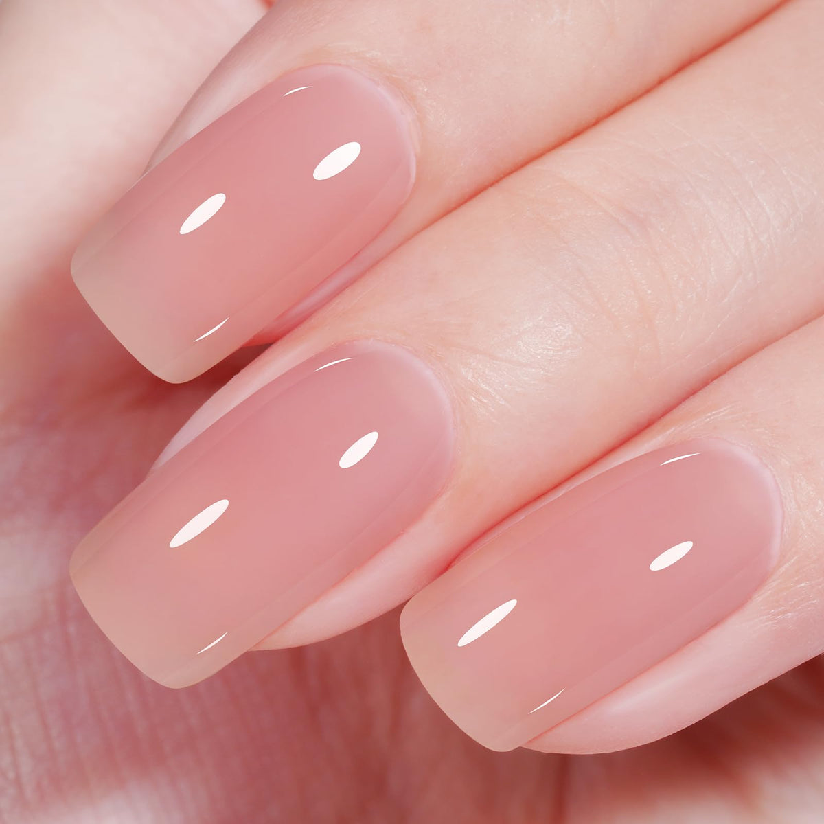 Vernis gel Nude Pink AILLSA, bouteille semi-transparente illustrant la teinte personnalisable.