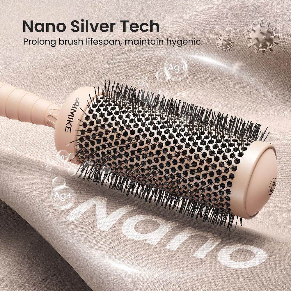 Brosse AIMIKE ronde avec barillet de 2,1 pouces pour brushing efficace.