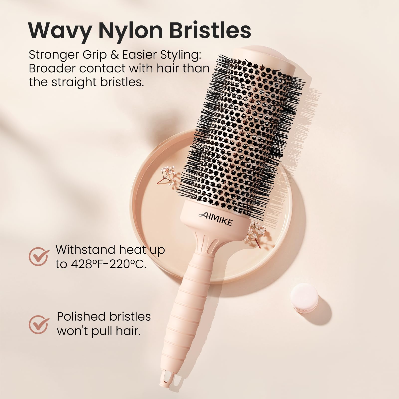 Brosse AIMIKE ronde offrant volume et brillance durable après le brushing.