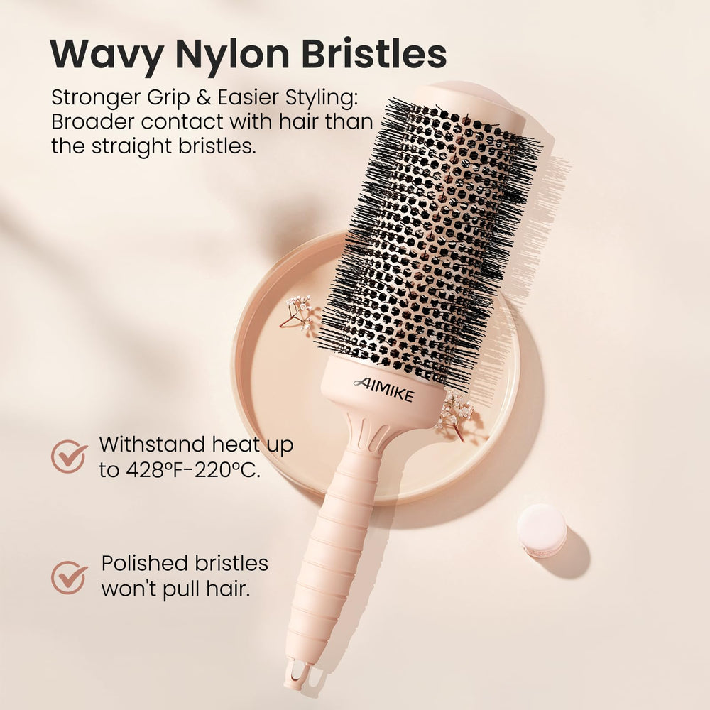 Brosse AIMIKE ronde offrant volume et brillance durable après le brushing.