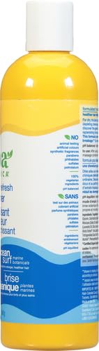 Alba Botanica Repair & Refresh Ocean Surf, logo distinctif sur fond marin.
