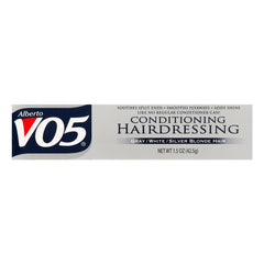 Soin VO5 texture crème sur cheveux, sensation douce et nourrissante.