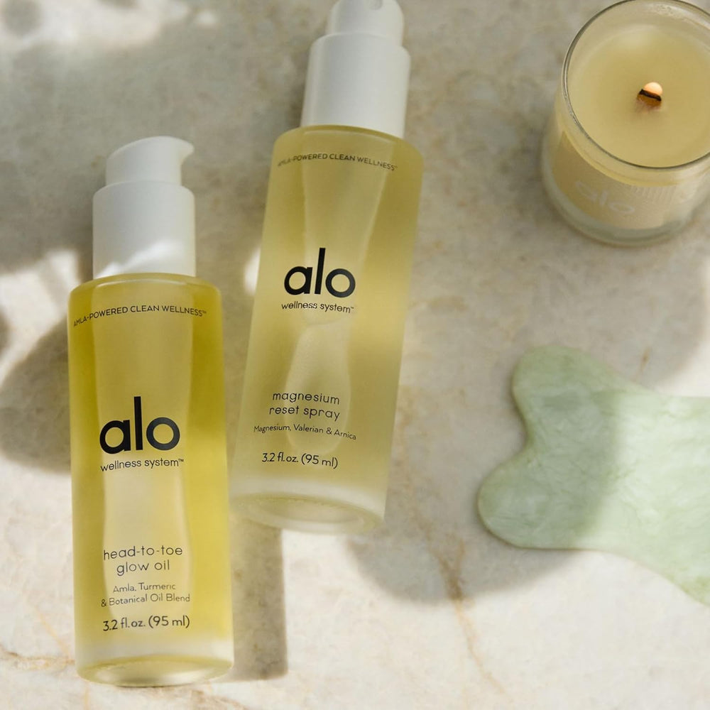 Alo Huile Éclat Ingrédients amla-aloe — extraits nourrissants et antioxydants.