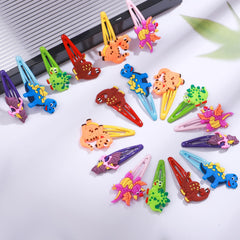 Barrettes dinosaure Alomois idéales pour fêtes et événements scolaires.