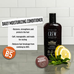 American Crew — massage du produit sur les cheveux pour nourrir sans les alourdir.