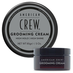 American Crew Grooming Cream bottle closeup demonstrates high-hold formula for sleek styles.