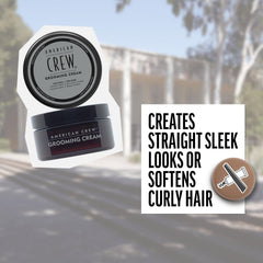 Product being applied by hands on hair for a refined finish.