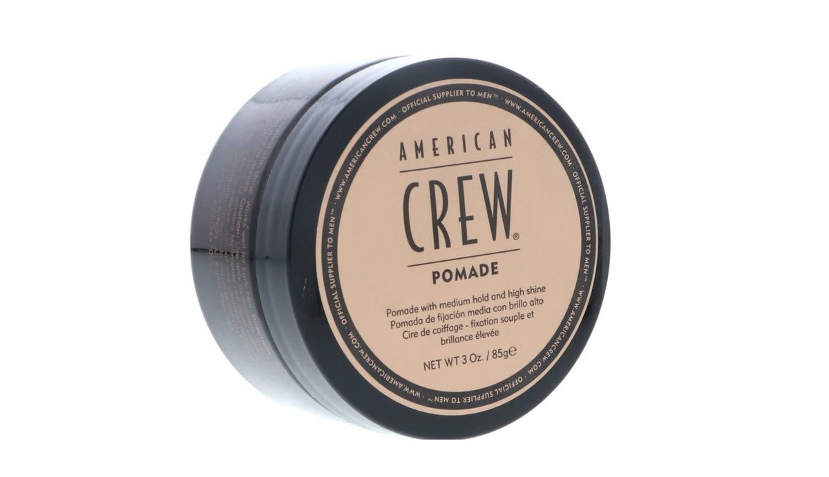 American Crew pomade pack-shot montrant le pack double pour un style poli.
