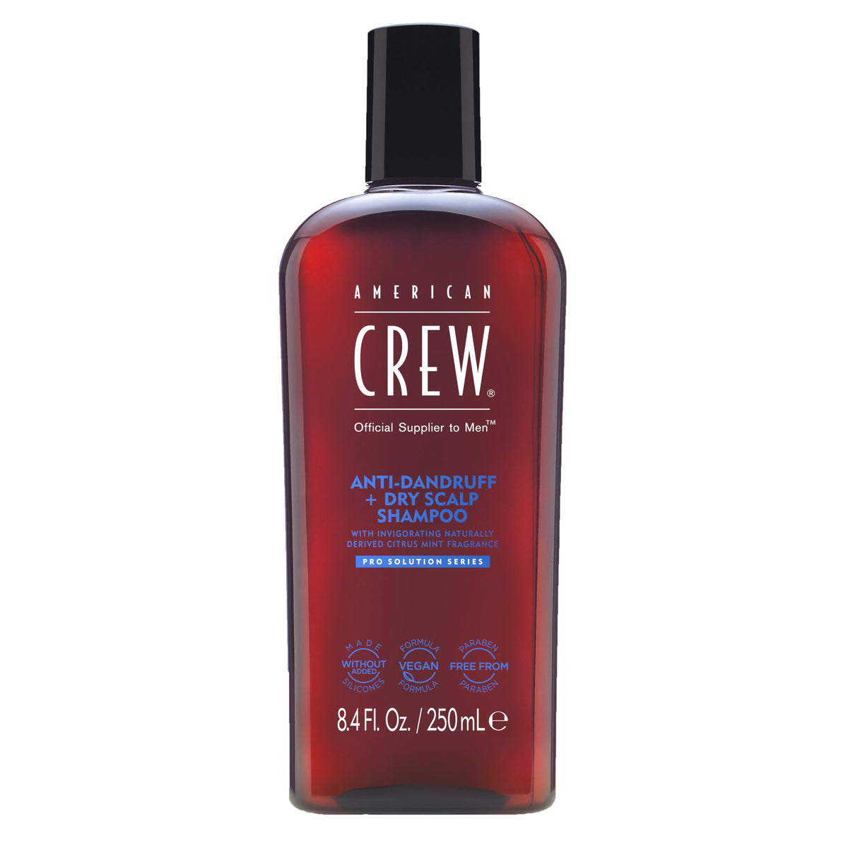 Shampoing anti pellicules American Crew sur la bouteille, réduit démangeaisons et pellicules.