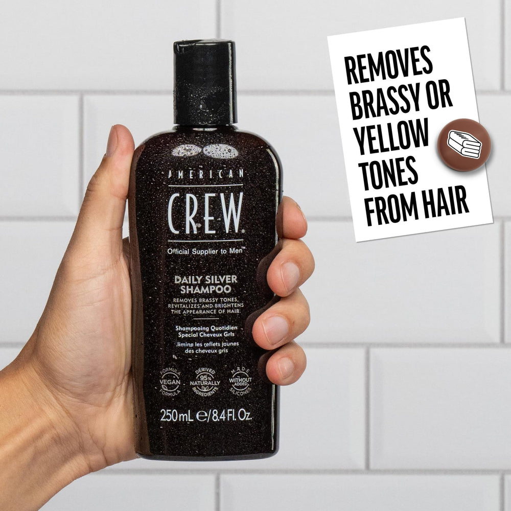 AMERICAN CREW Shampoing Argent, étiquette claire, produit masculin premium.