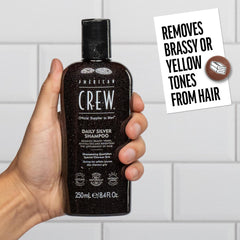 AMERICAN CREW Shampoing Argent, étiquette claire, produit masculin premium.