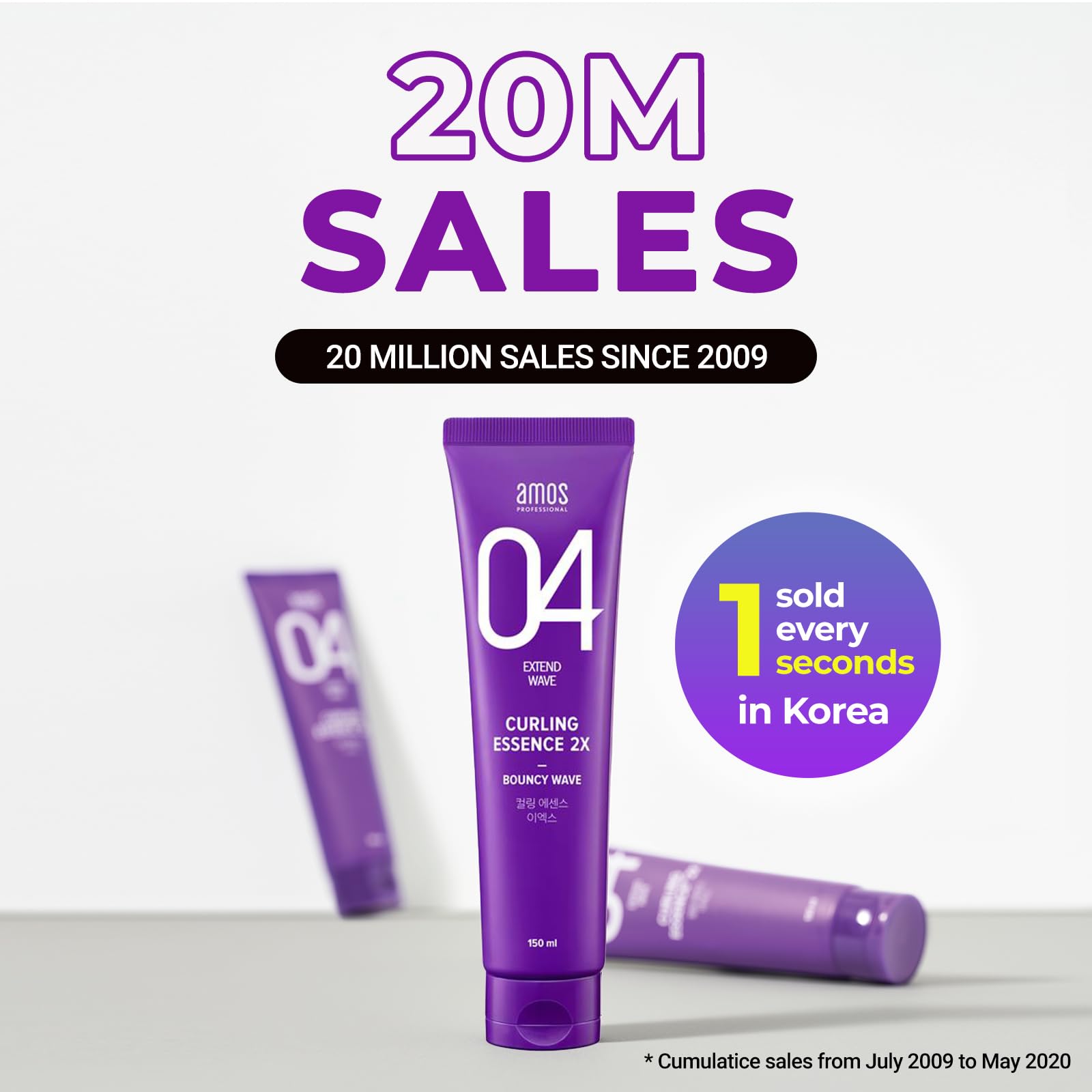Applying AMOS PROFESSIONAL Curl Defining Cream to damp hair for even distribution.