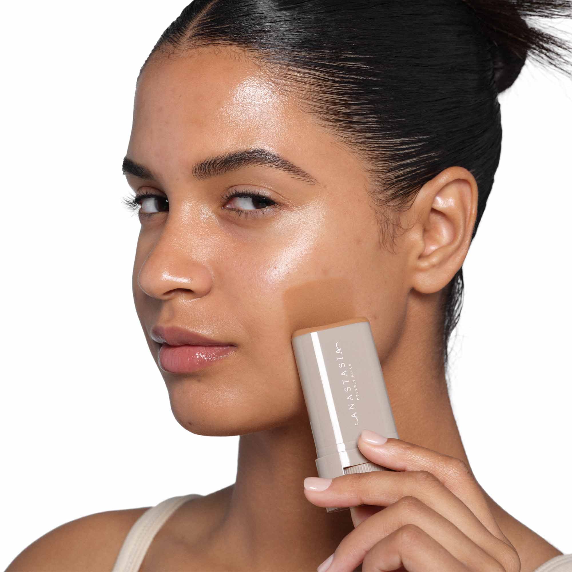 Texture du produit sur peau, aspect sain et lumineux.
