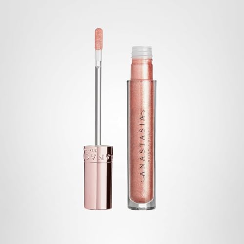 Brillant pour les lèvres Anastasia Beverly Hills Amber Sparkle, tenue légère et sourire scintillant.