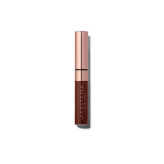 Anastasia Beverly Hills gel teinté pour sourcils, teinte rouge cuivre et application lisse.