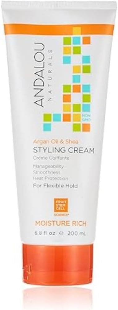 Andalou Naturals crème de coiffage hydratante en bouteille pour cheveux doux et brillants.