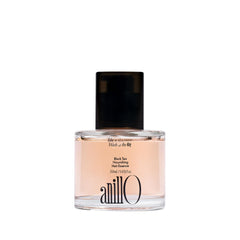 ANILLO essence-cheveux thé noir en bouteille pour nourrir les longueurs.