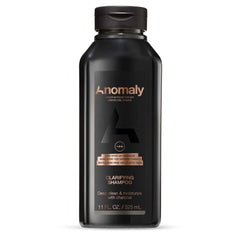 Anomaly shampooing clarifiant: bouteille 325 ml purifie les résidus et rafraîchit les cheveux.