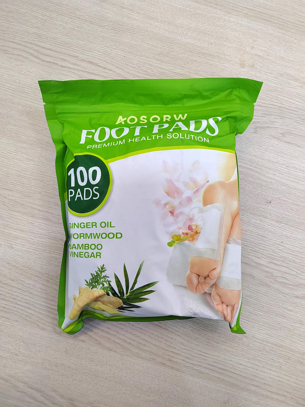 AOSORW ginger oil bamboo charcoal closeup emphasizes soothing ingredients for nightly use.