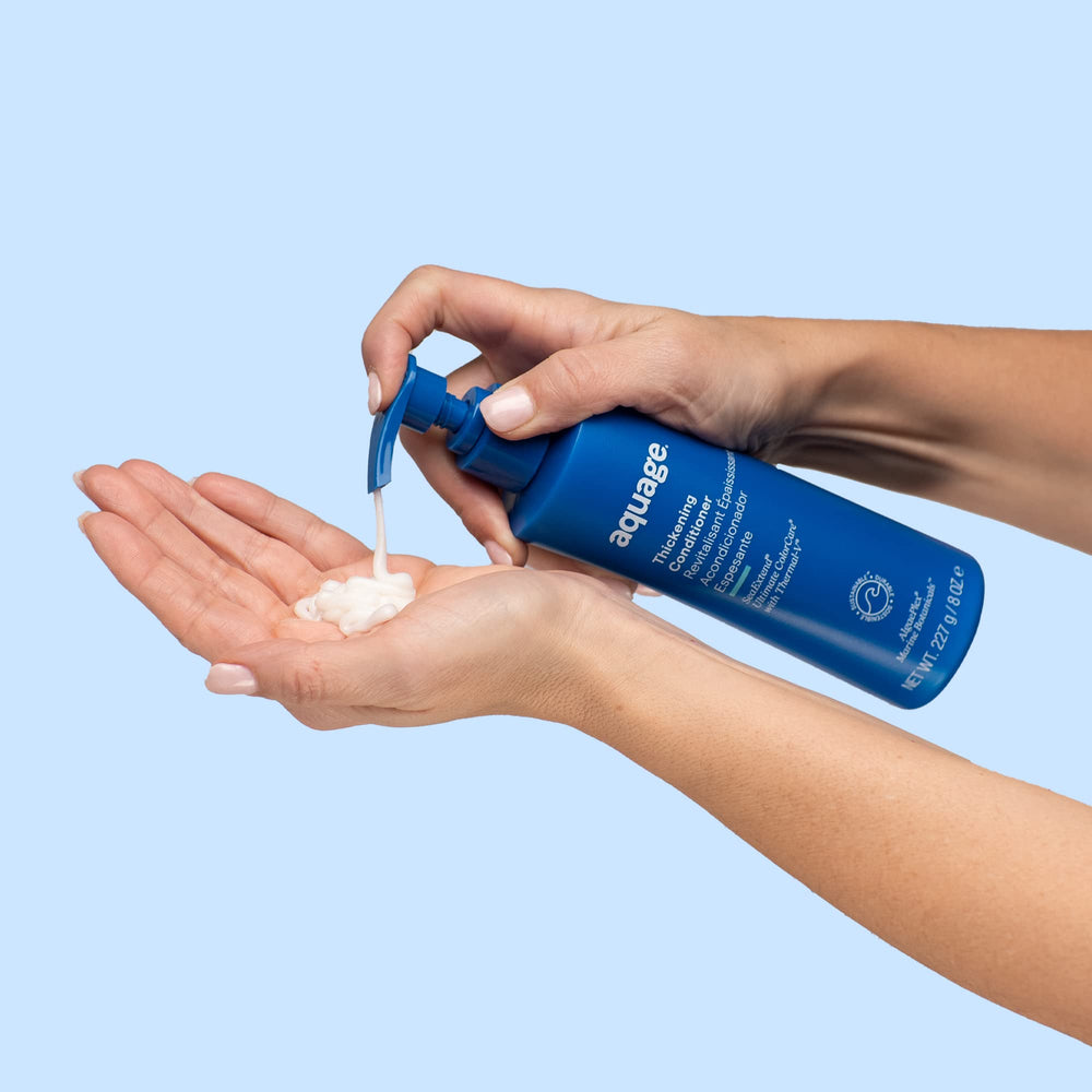 Finition lisse et sans frisottis grâce au Aquage SeaExtend Conditionneur Épaississant.