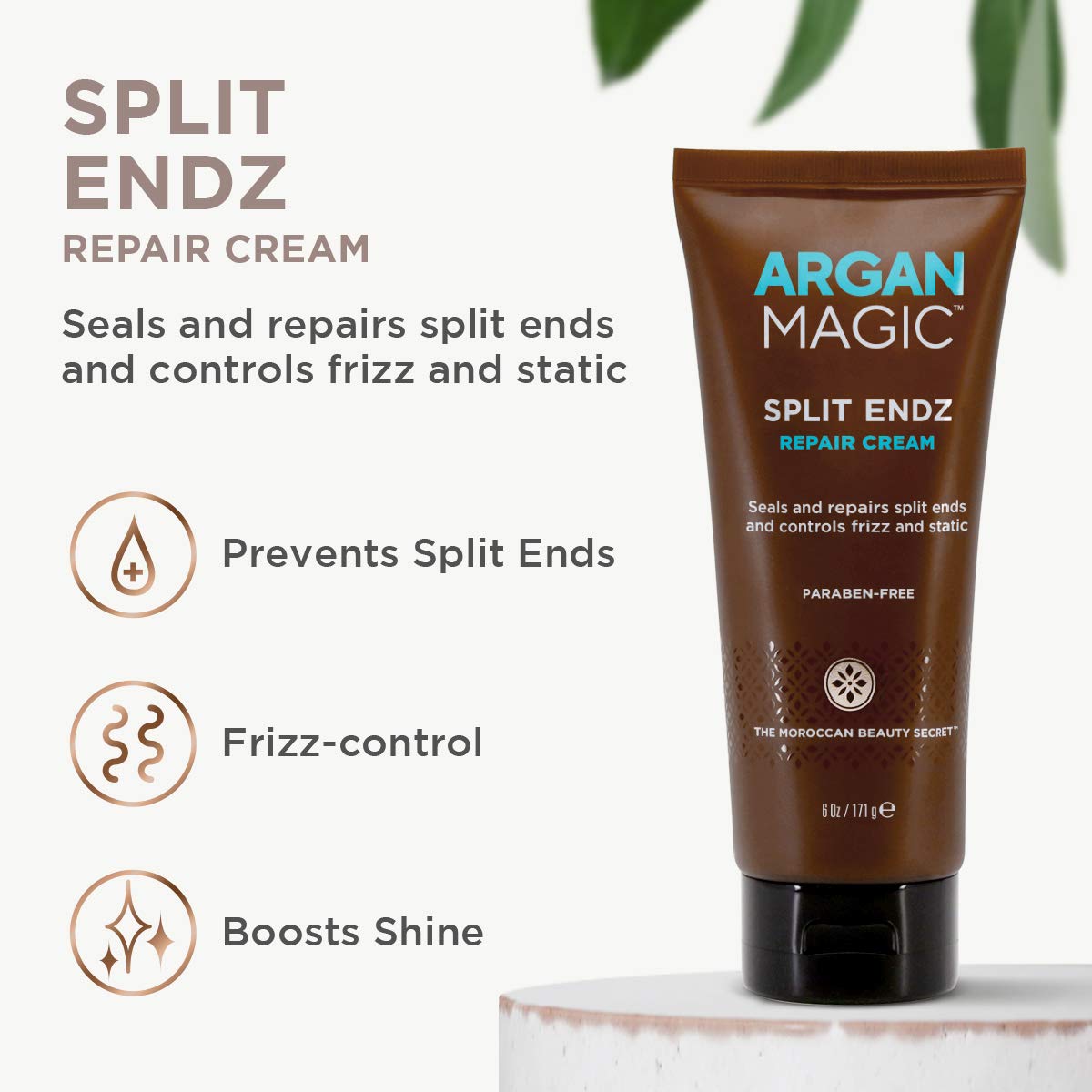 Texture being smoothed onto damp hair with Argan Magic Split Endz Cream.