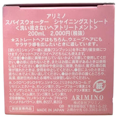 Arimino Eau d'Épices Application-Mains montre l'application sur cheveux humides.