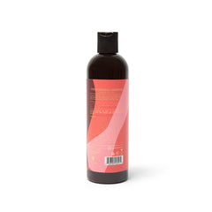 Marque As I Am – texture crèmeuse visible sur cheveux propres et hydratés.