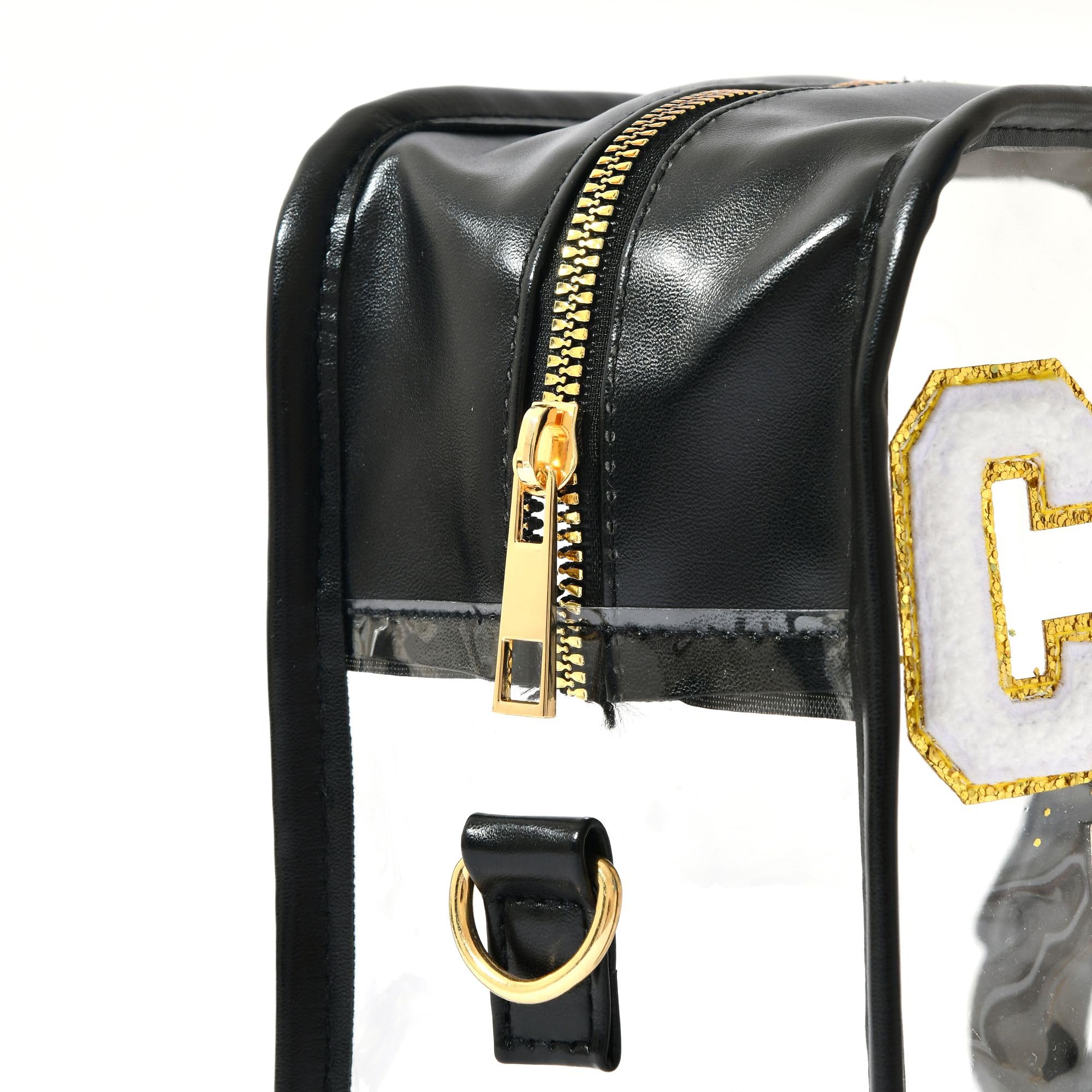 Design noir et clair avec fermeture dorée sur le sac CHEER PINS.