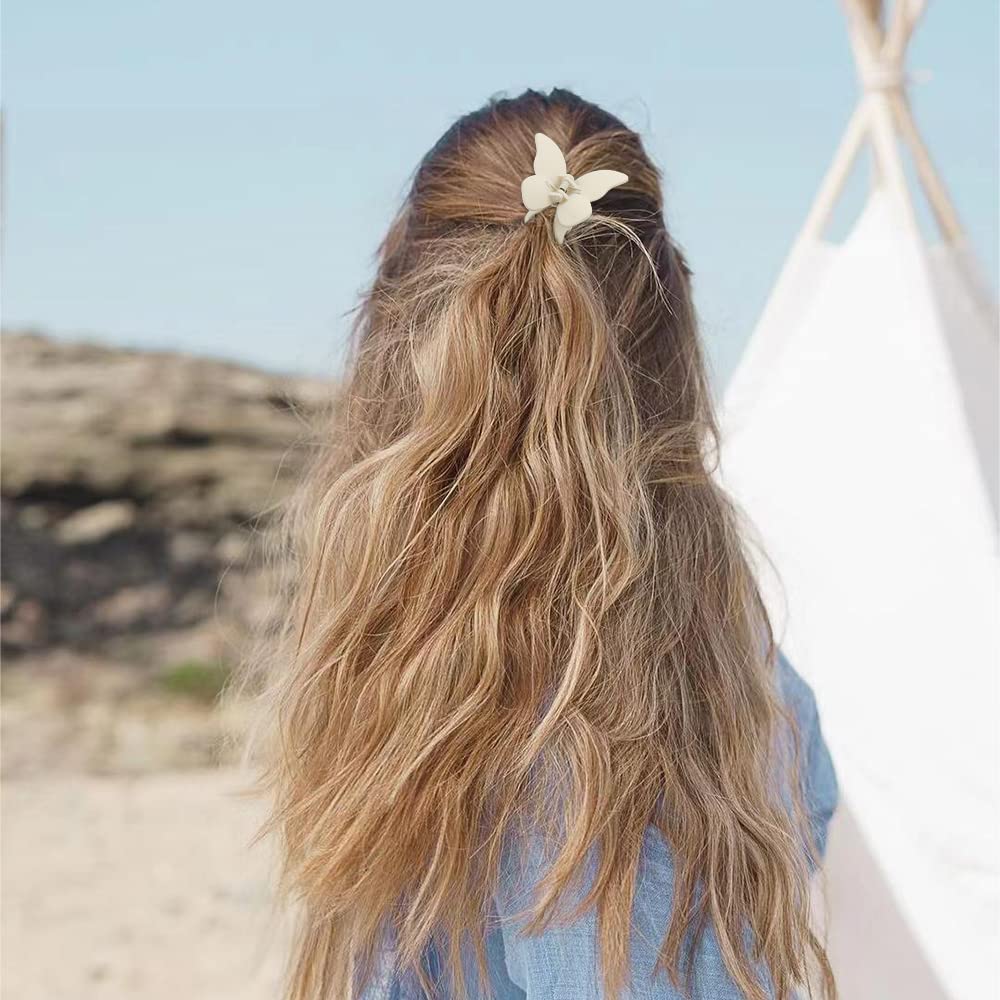 Pinces papillon Atoden rose mat, accessoire tendance pour cheveux fins à moyens.
