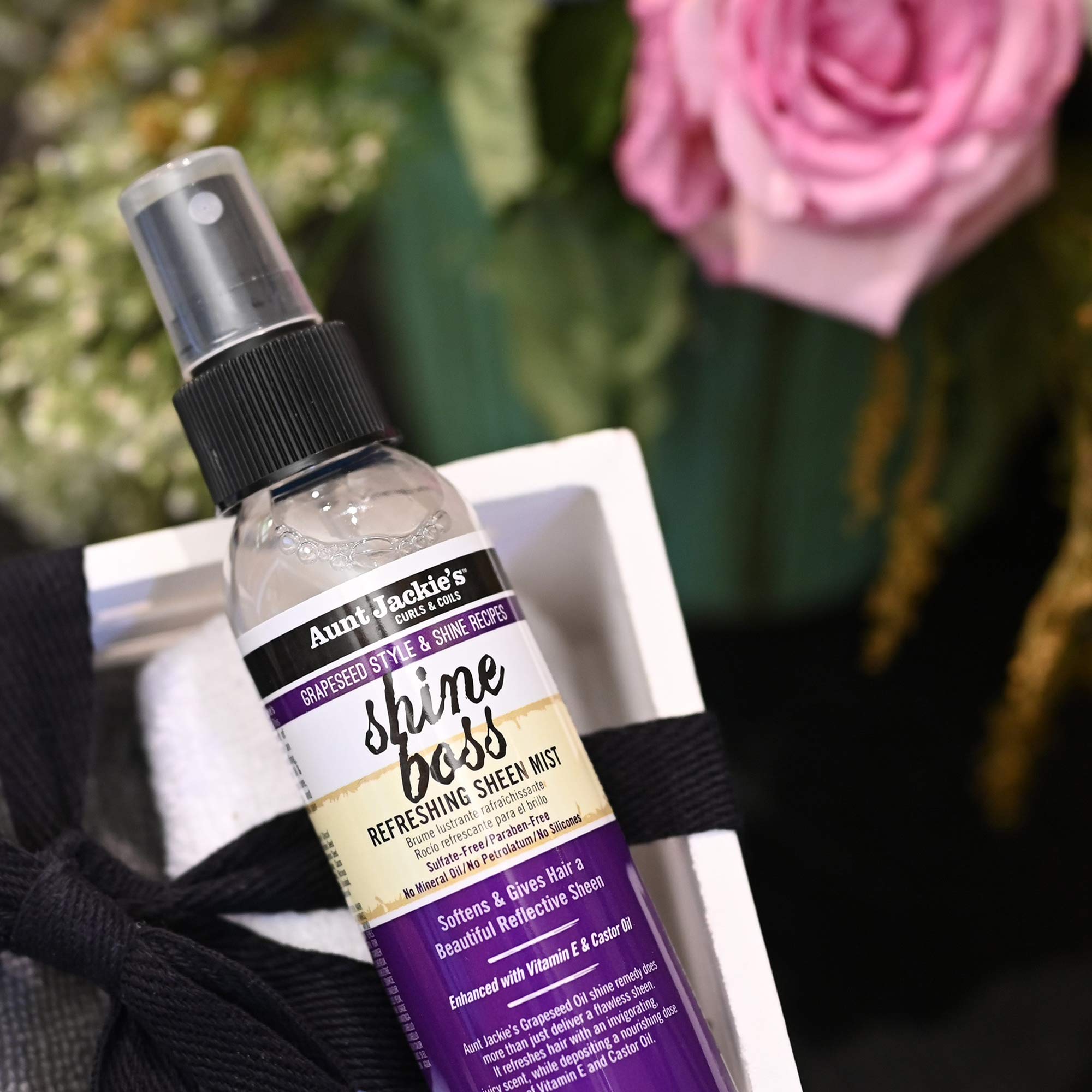 Fini léger et brillant sur cheveux texturés avec Shine Boss