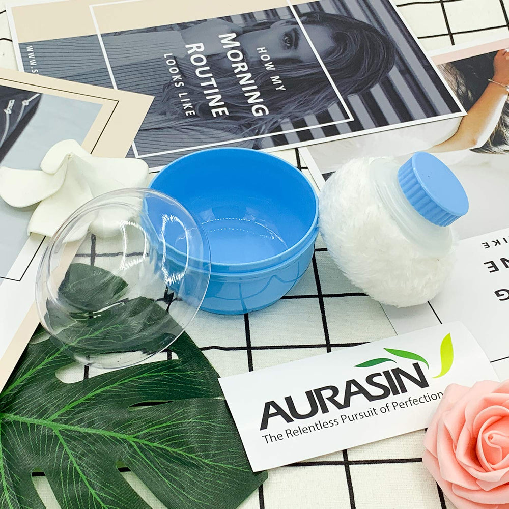 Puff bleu doux AURASIN pour une application après bain.
