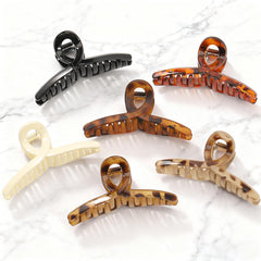Barrette tortue moyenne 4,3 pouces par Auseibeely offre une tenue stable pour cheveux fins