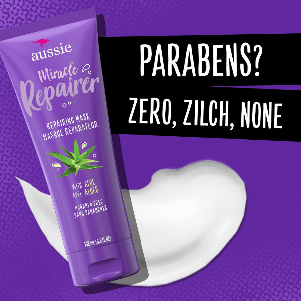 Aussie Miracle Repairer Masque Reconstruction – massage capillaire pour distribution uniforme.