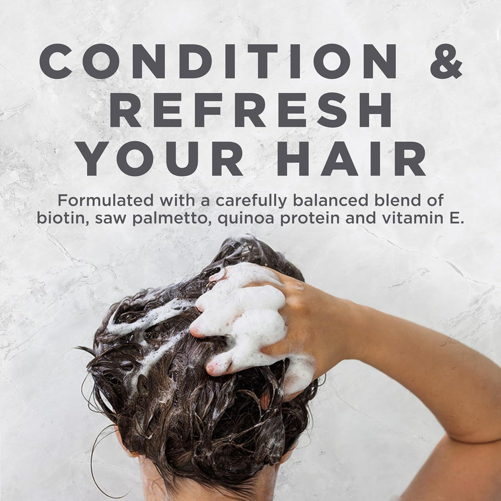 Avalon Organics Therapy Biotin B-Complex après-shampoing sur cheveux démêlés et épais.