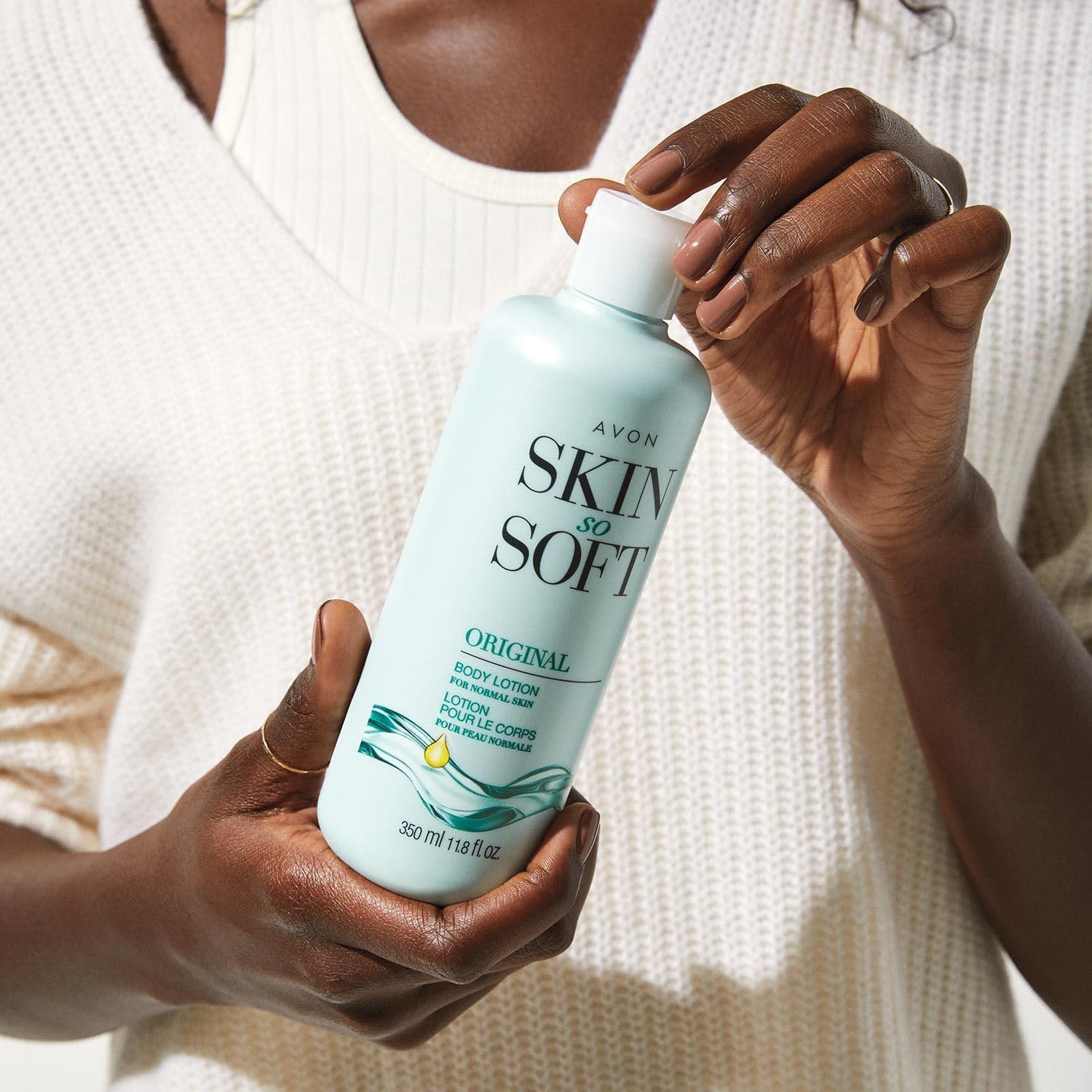 Avon Skin So Soft Original creamy texture close-up suggesting comfort.