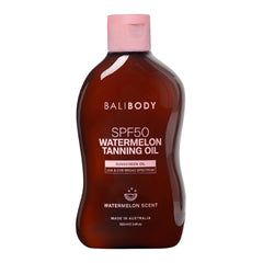 BALI BODY Watermelon – bouteille d'huile bronzante SPF50 pour une teinte dorée naturelle.
