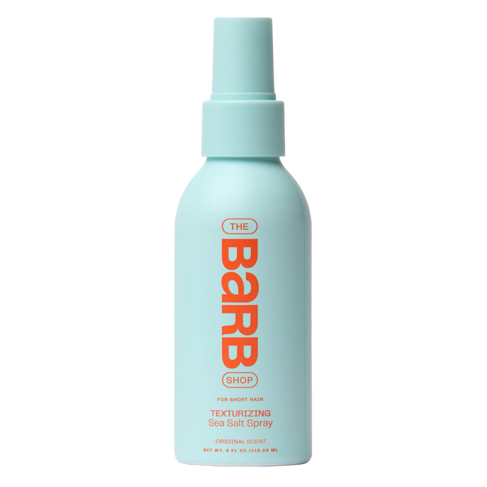 The Barb Shop brume d’eau de mer sur bouteille originale, texture plage douce.
